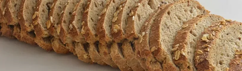 Whole-grain bread slices showing blood sugar impact