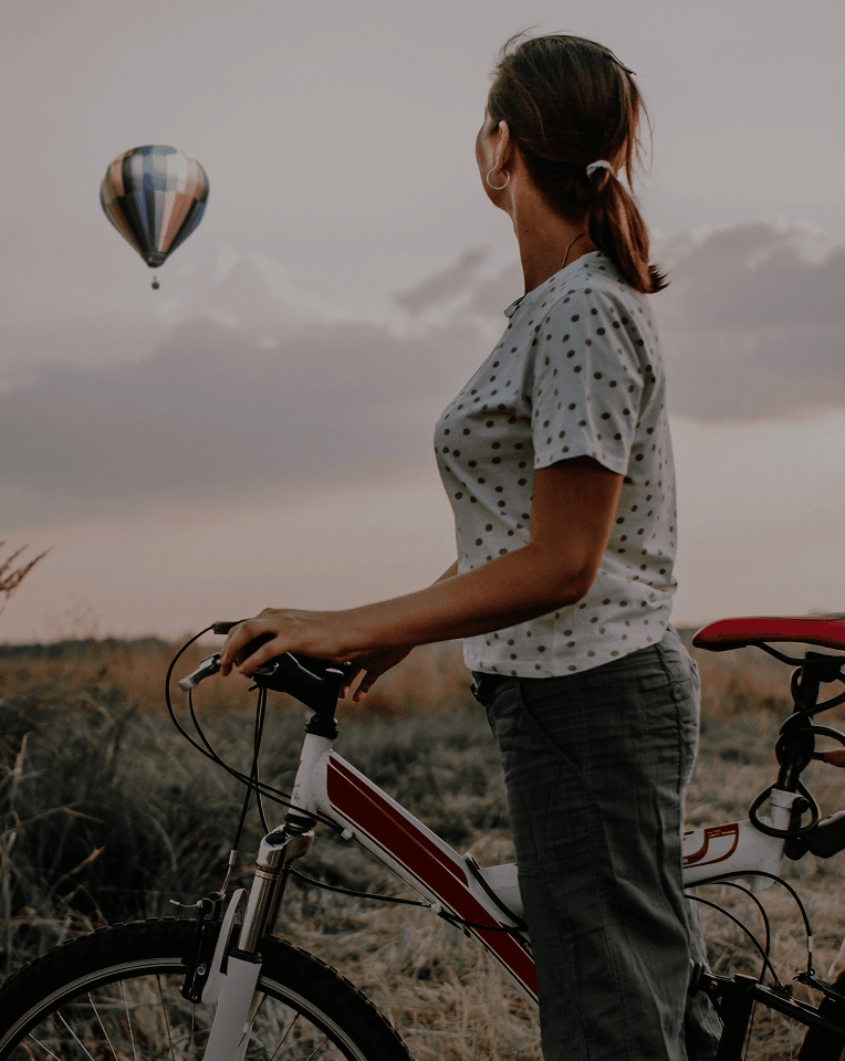 Woman looking at hot air balloon